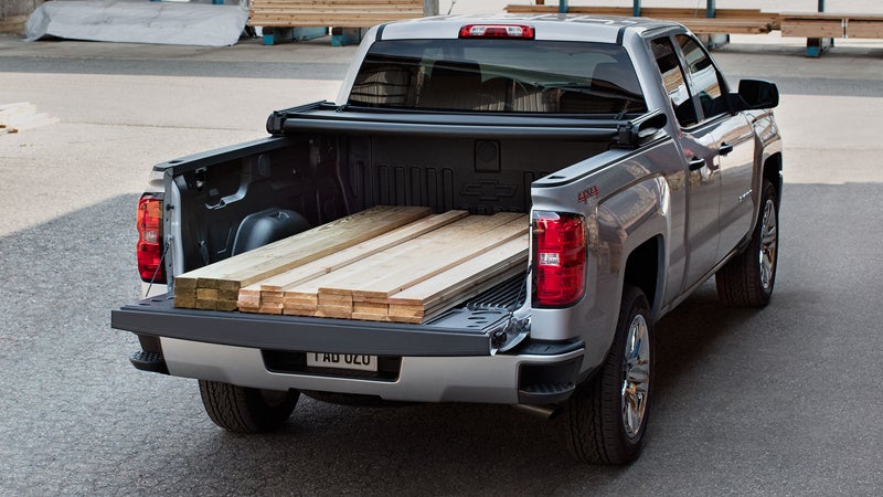Image of a silverado with 2x4 in the bed