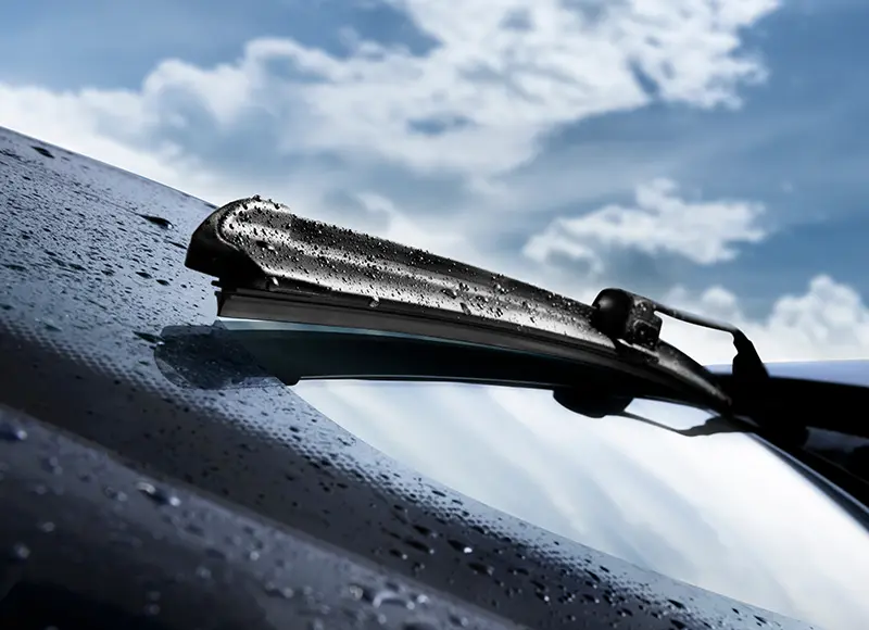 Image of a windshield wiper in rain